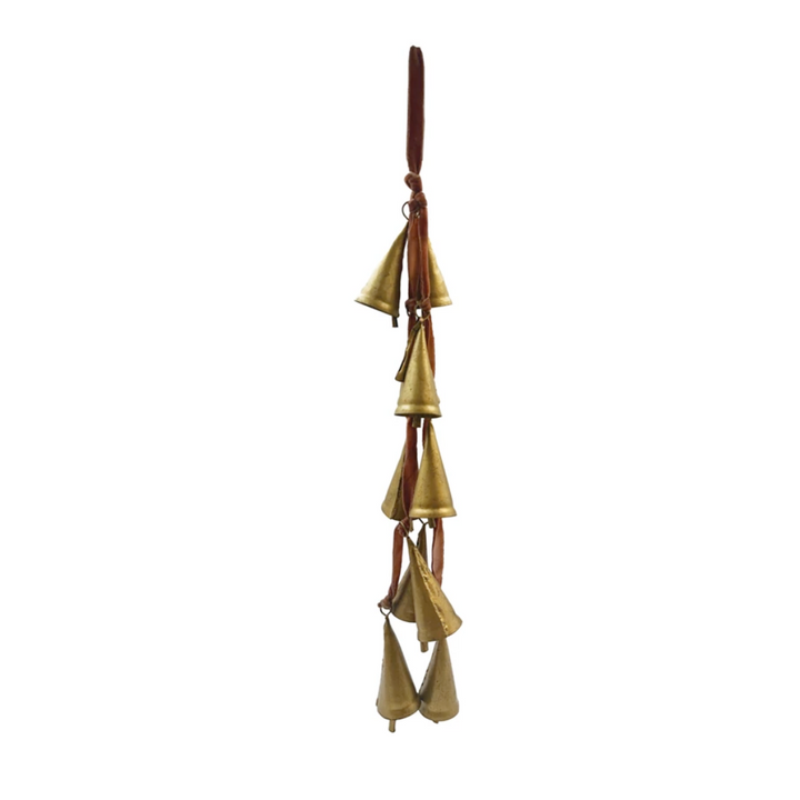 Decorative hanging bells with a brown velvet ribbon on a white background