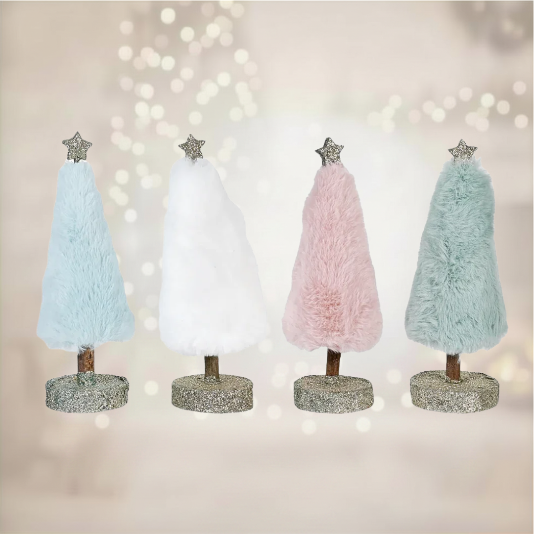 Four decorative faux fur trees with fur-like texture and glittery bases on a blurred bokeh background.