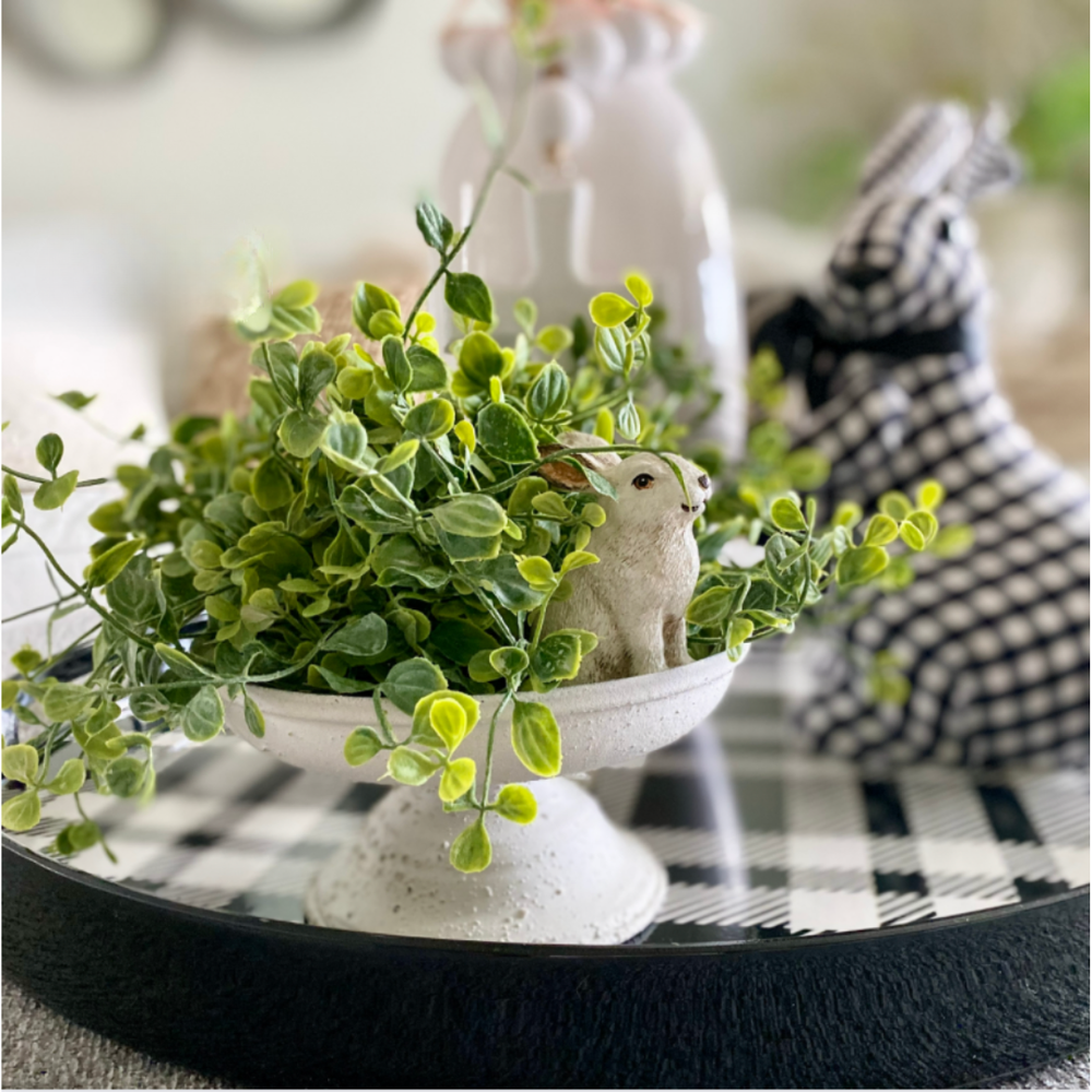 Seraph Vine Half Sphere with a decorative bunny figurine on a checkered surface