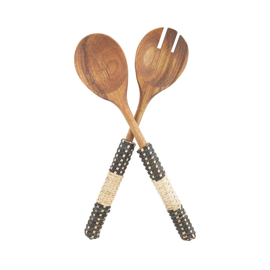 Wooden salad servers with decorative handles on a white background