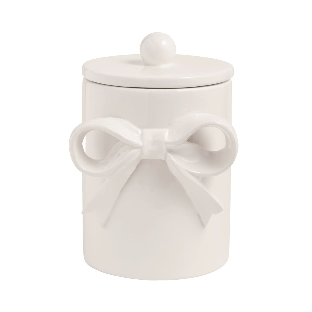 White ceramic jar with a lid and decorative bow on a white background