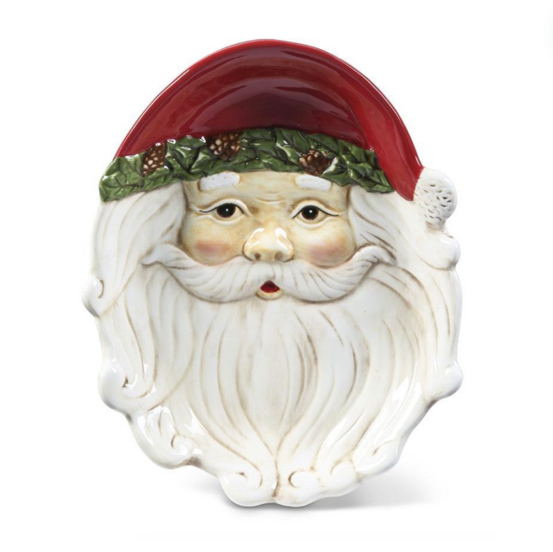 A ceramic Santa Claus serving platter with a red hat and pinecone trim.