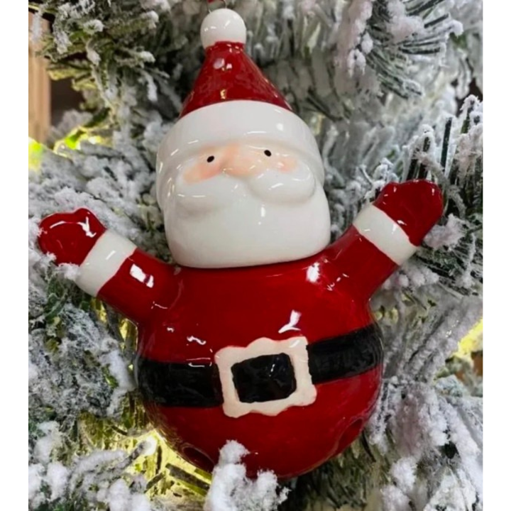 Decorative Santa Claus ornament on a Christmas tree.