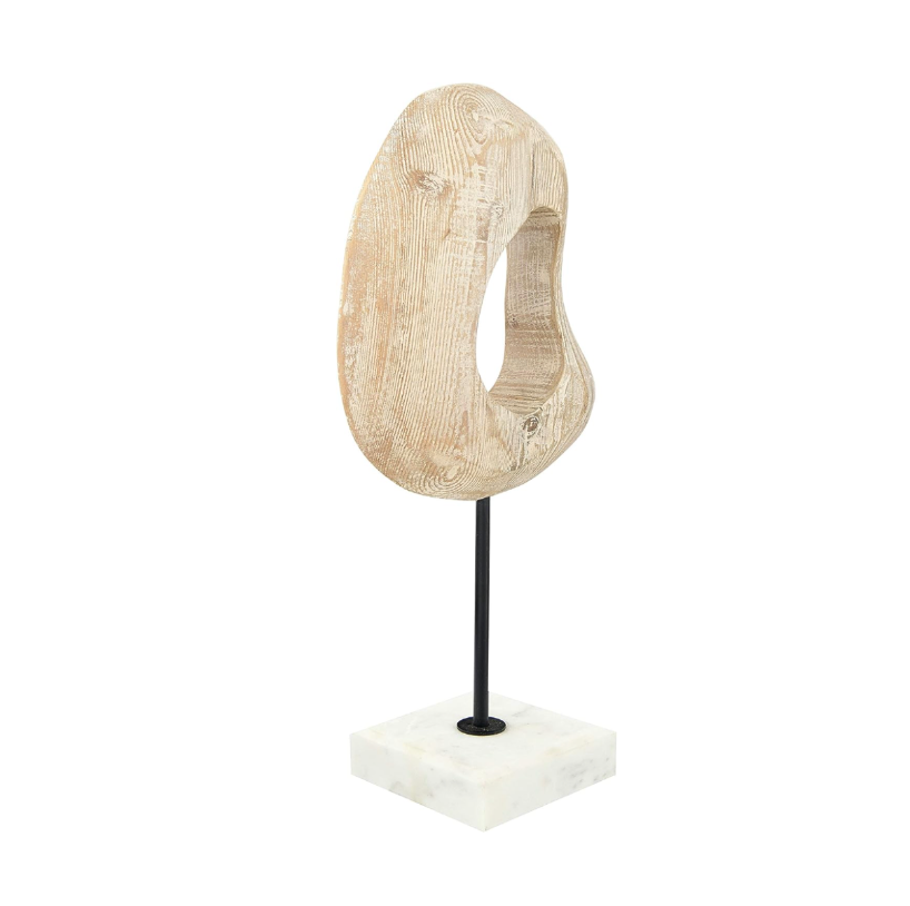 Decorative object on a marble stand with a white background