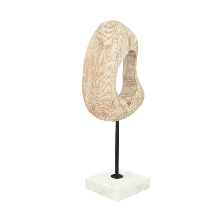 Decorative object on a marble stand with a white background