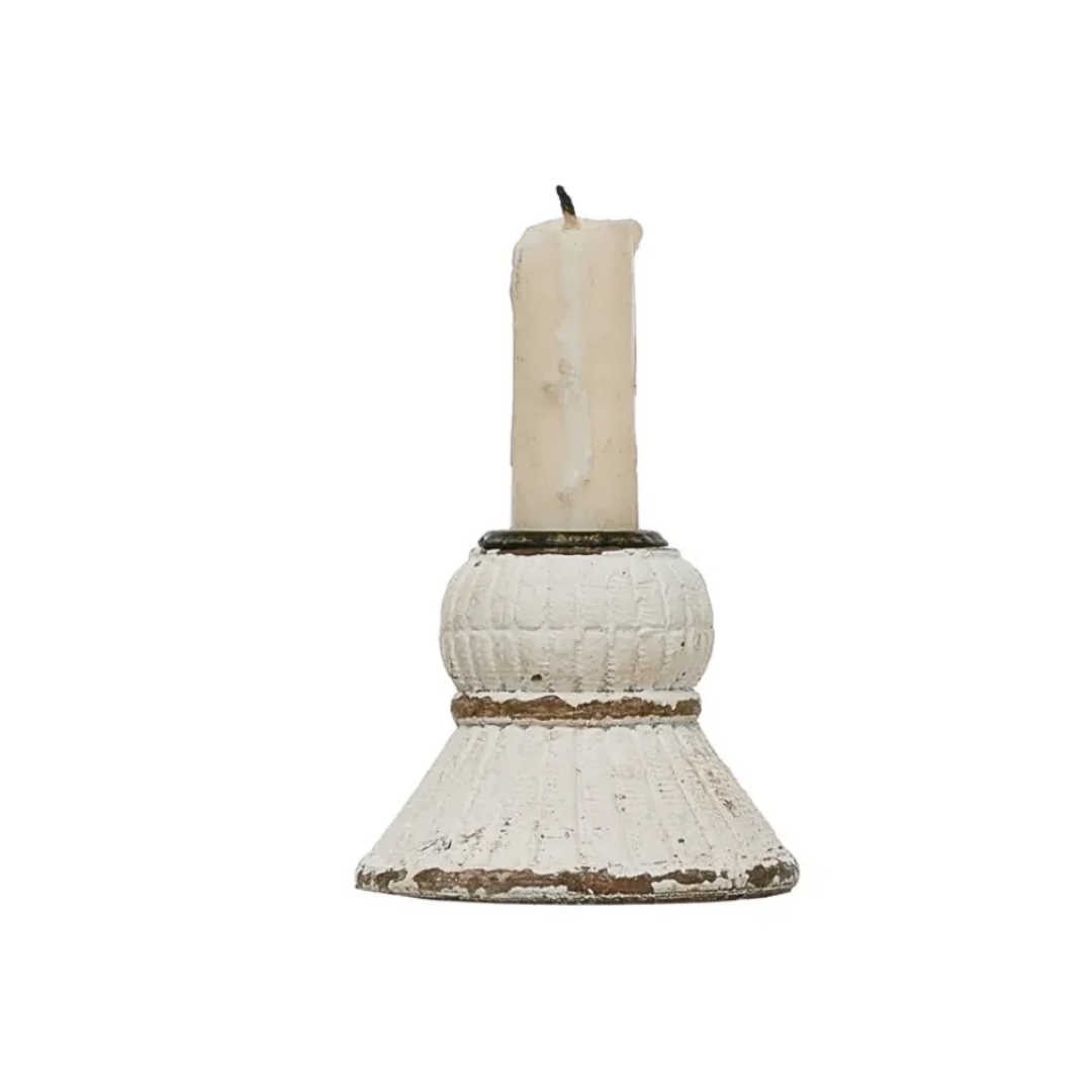 Decorative candle holder with a candle on a white background