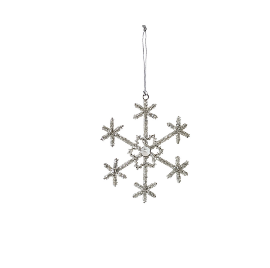 Decorative snowflake ornament on a white background