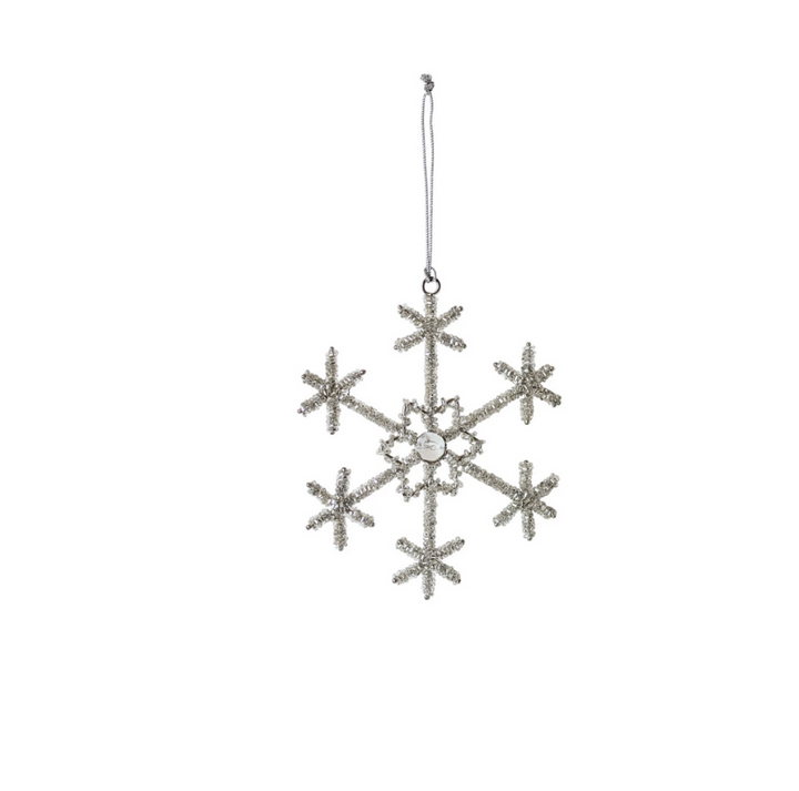 Decorative snowflake ornament on a white background