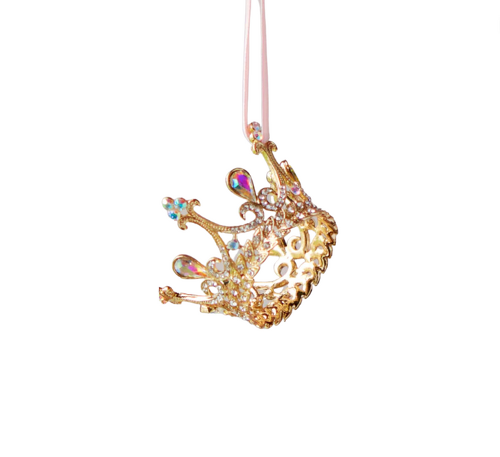 A sparkly gold-colored crown ornament with pearls and rhinestones, designed for Christmas decoration.