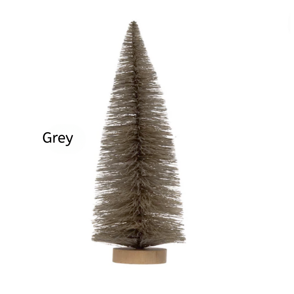 Decorative Christmas tree with a wooden base on a white background