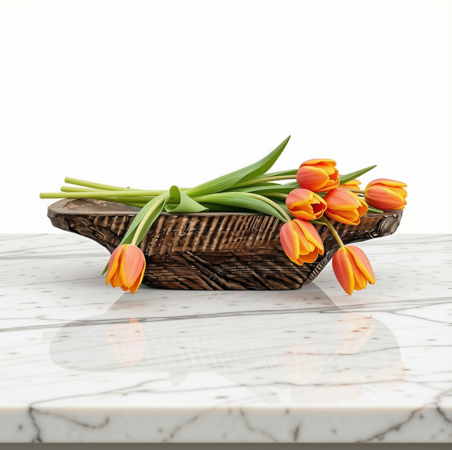 A dark brown Hand-Carved Wooden Dough Bowl holding orange tulips with green stems, placed on a white marble surface against a white studio background.