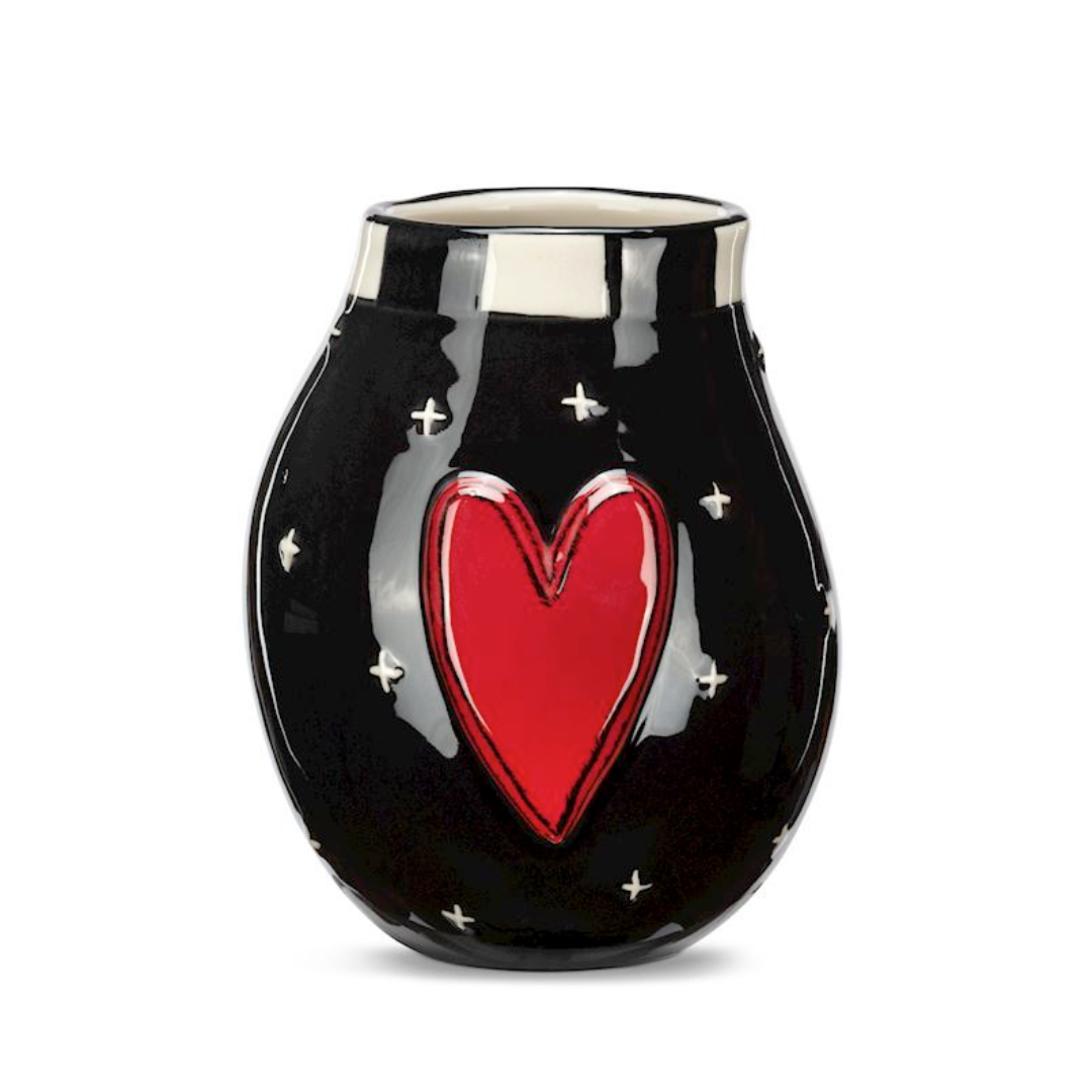 A black stoneware black mini vase with a red heart and small stars design, handcrafted.