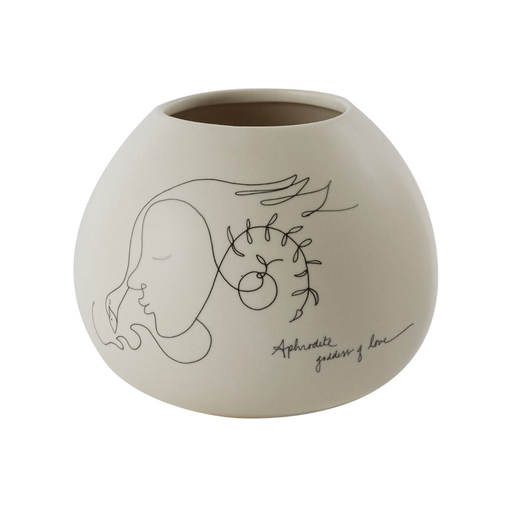 Decorative vase with artistic design on a white background.