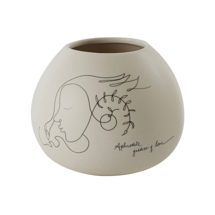Decorative vase with artistic design on a white background.