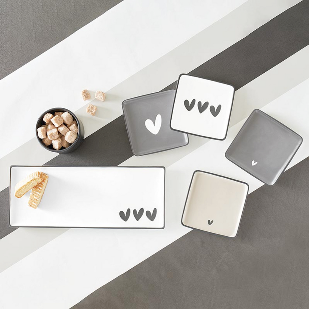 Set of 4 ceramic heart appetizer plates with matching heart ceramic serving tray.