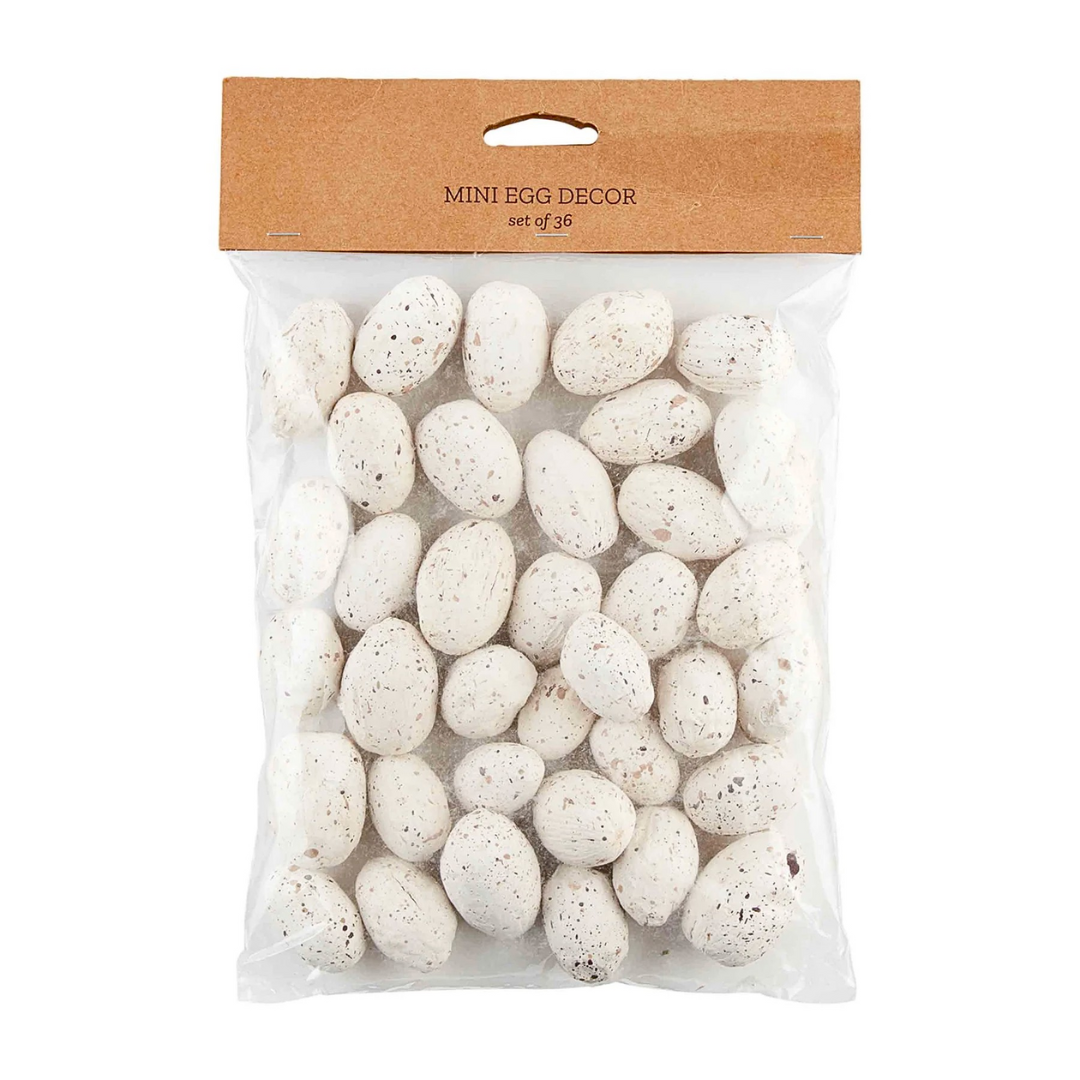 Packaged mini egg decor with a brown cardboard top on a white background