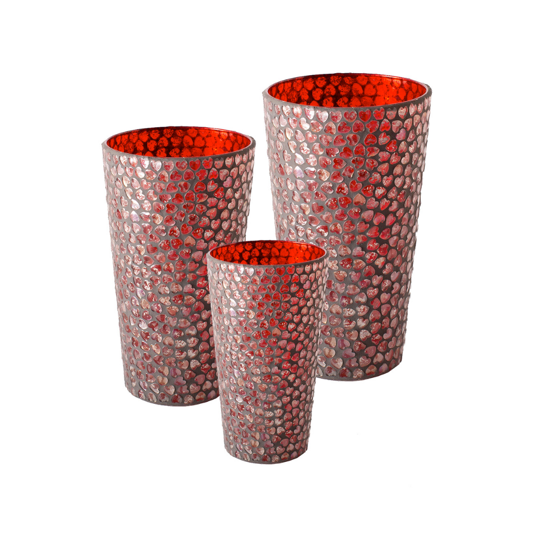 Three decorative vases with red interior and metallic exterior on a white background