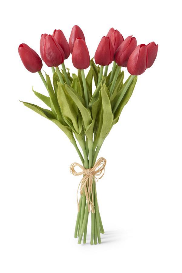 Bouquet of red tulips tied with a beige ribbon on a white background