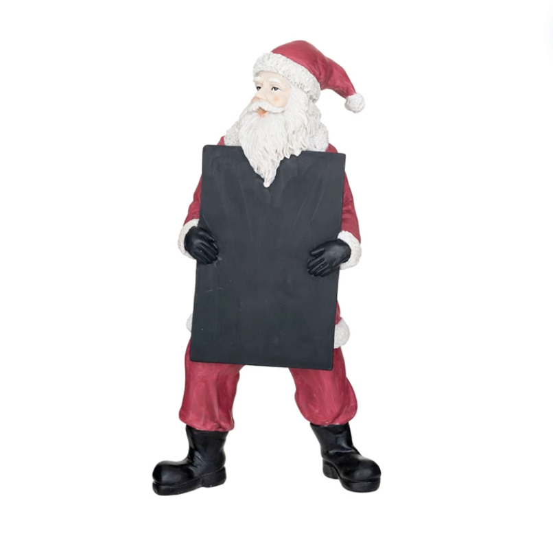 A vintage inspired Santa With Chalkboard decoration, featuring a resin Santa figure in red and white holding a chalkboard 