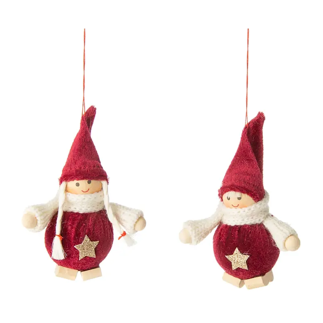 Two boy and girl Christmas ornaments with red hats and red bodies on a white background