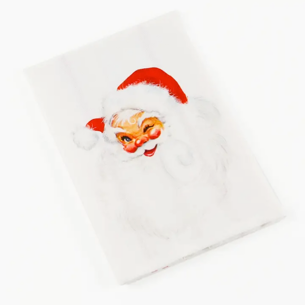 White tea towel with a vintage Santa Claus face design on a white background