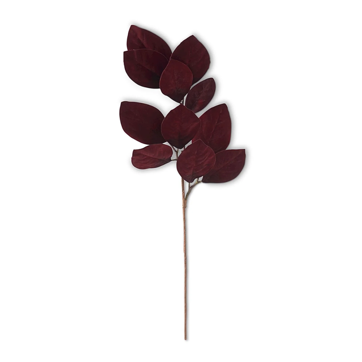 Artificial red leaf stem on a white background