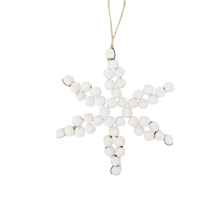 Star-shaped ornament made of white beads on a string against a white background