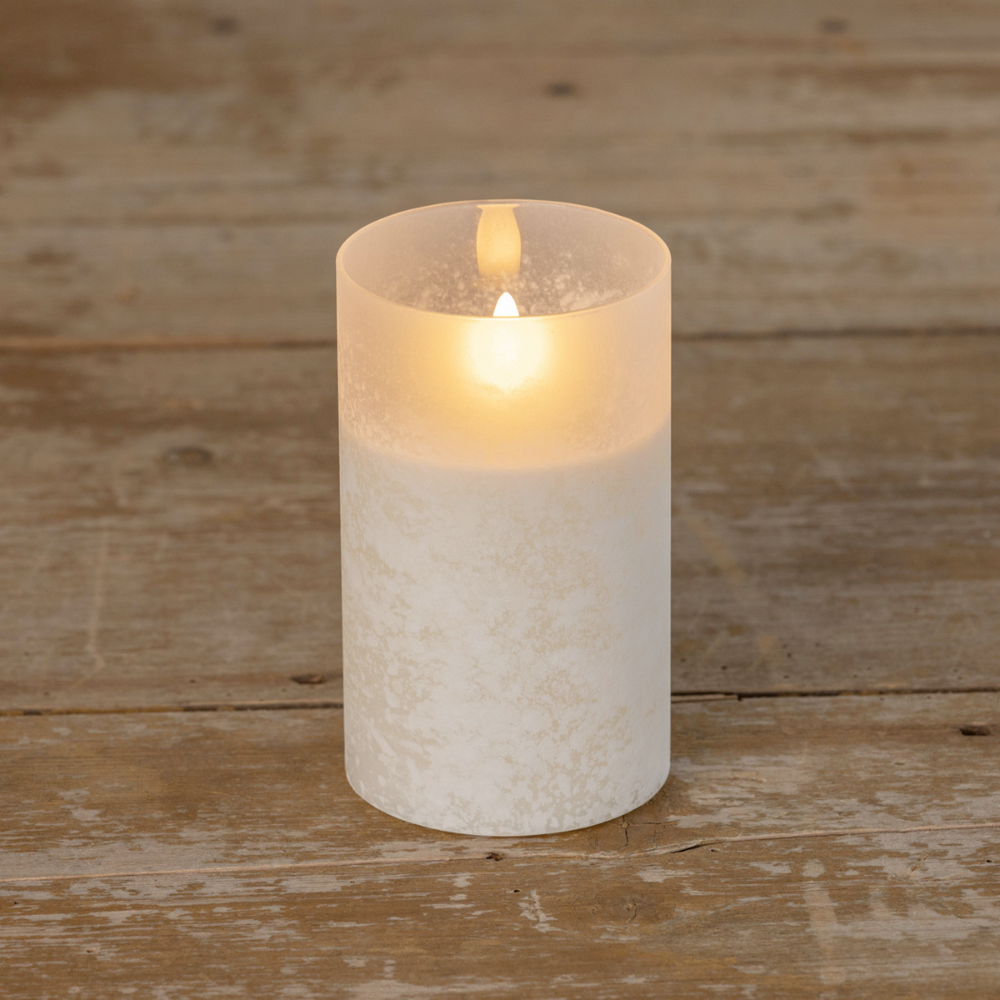 White frosted glass 3D flame candle on a wooden surface