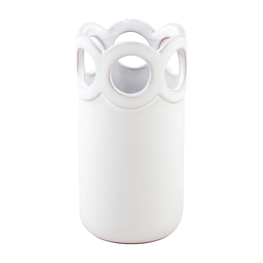 Three white terracotta bud vases with scalloped edge design, displayed on a woven surface. Each vase has cut-out scallop detailing and is in different sizes.