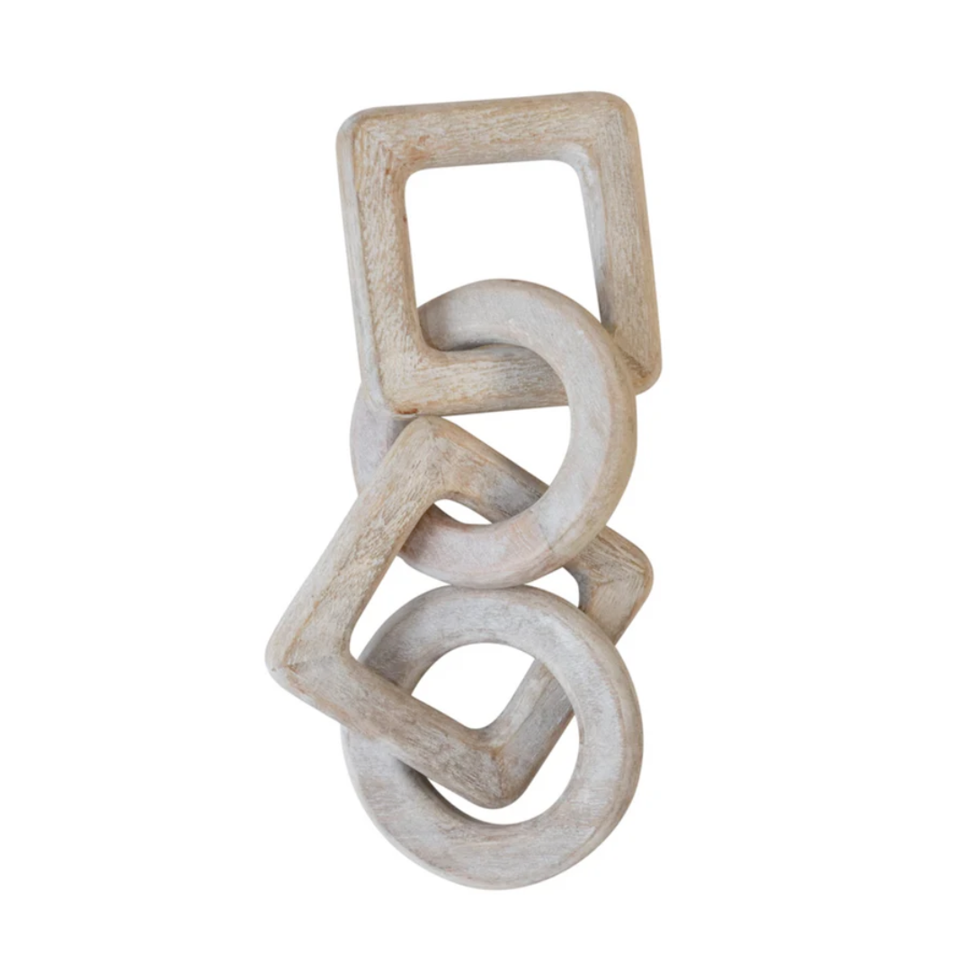 Wooden interlocking rings on a white background