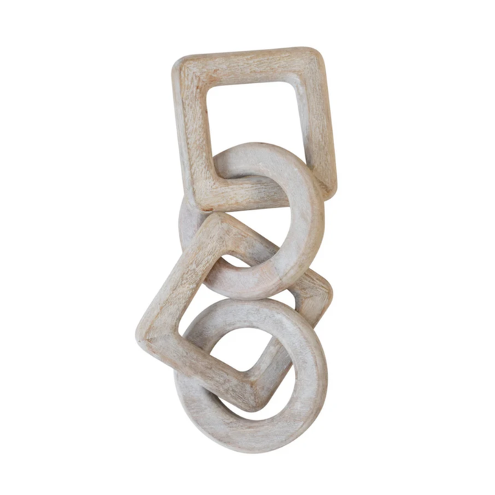 Wooden interlocking rings on a white background