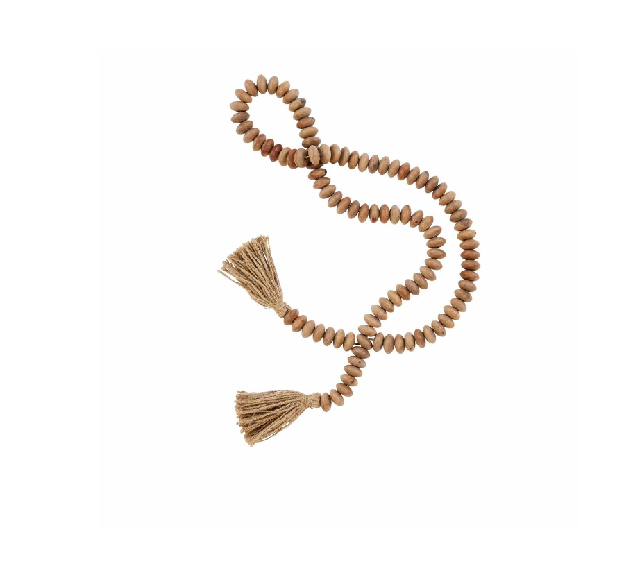 Wooden bead garland with jute tassels, displayed on a white background.