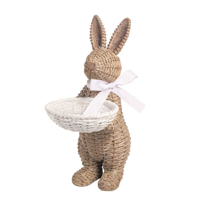 Wicker bunny holding a basket on a white background