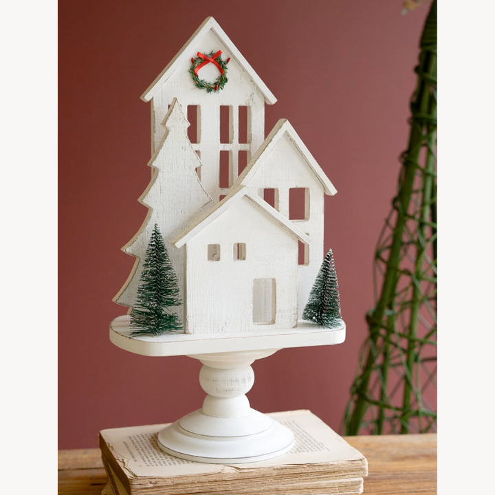 White Wooden Christmas Village On Pedestal
