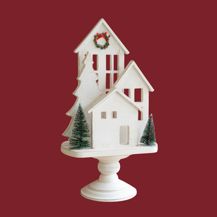 White Wooden Christmas Village On Pedestal