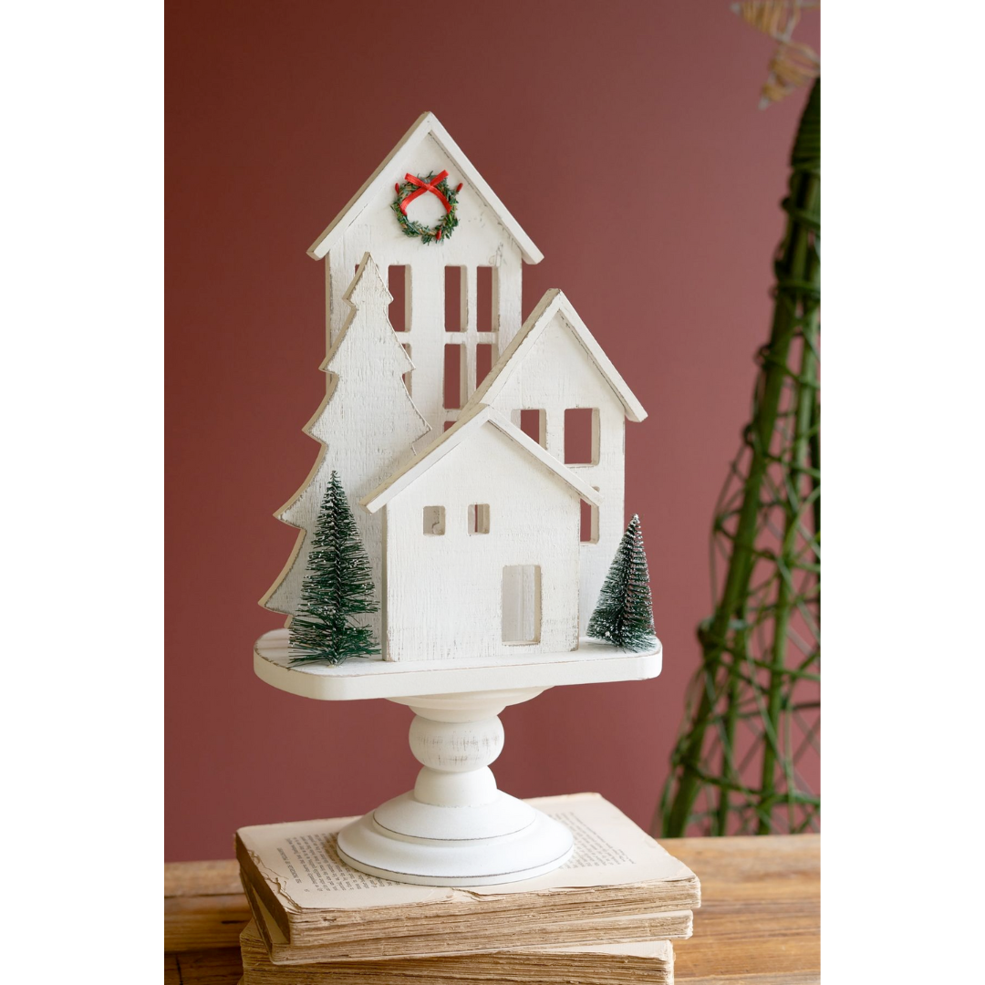 White Wooden Christmas Village On Pedestal